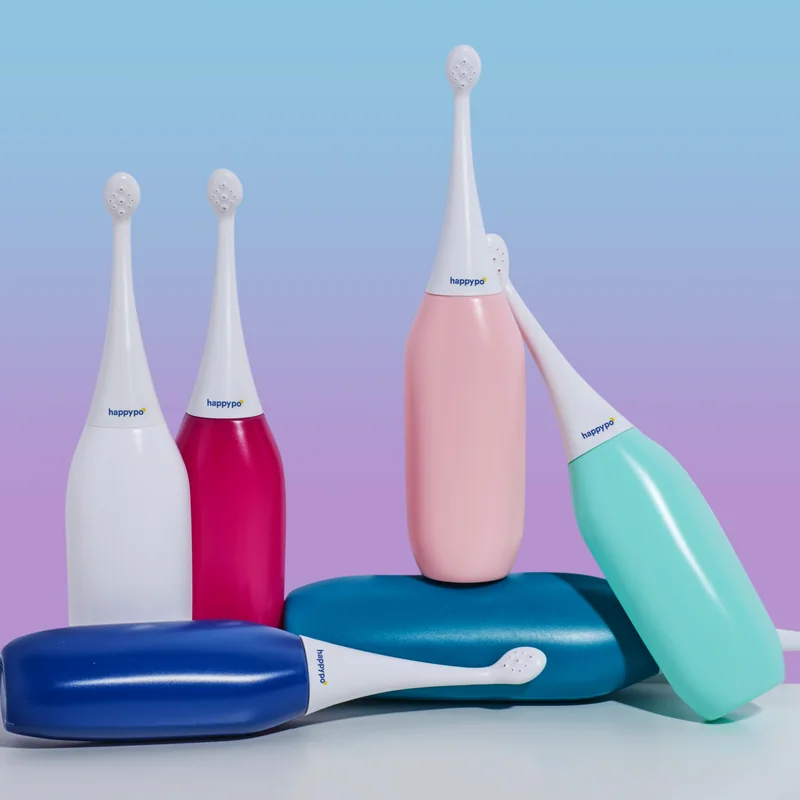 HappyPo bottles in white, magenta, rose, mint and two blues grouped on a sky-to-lilac backdrop